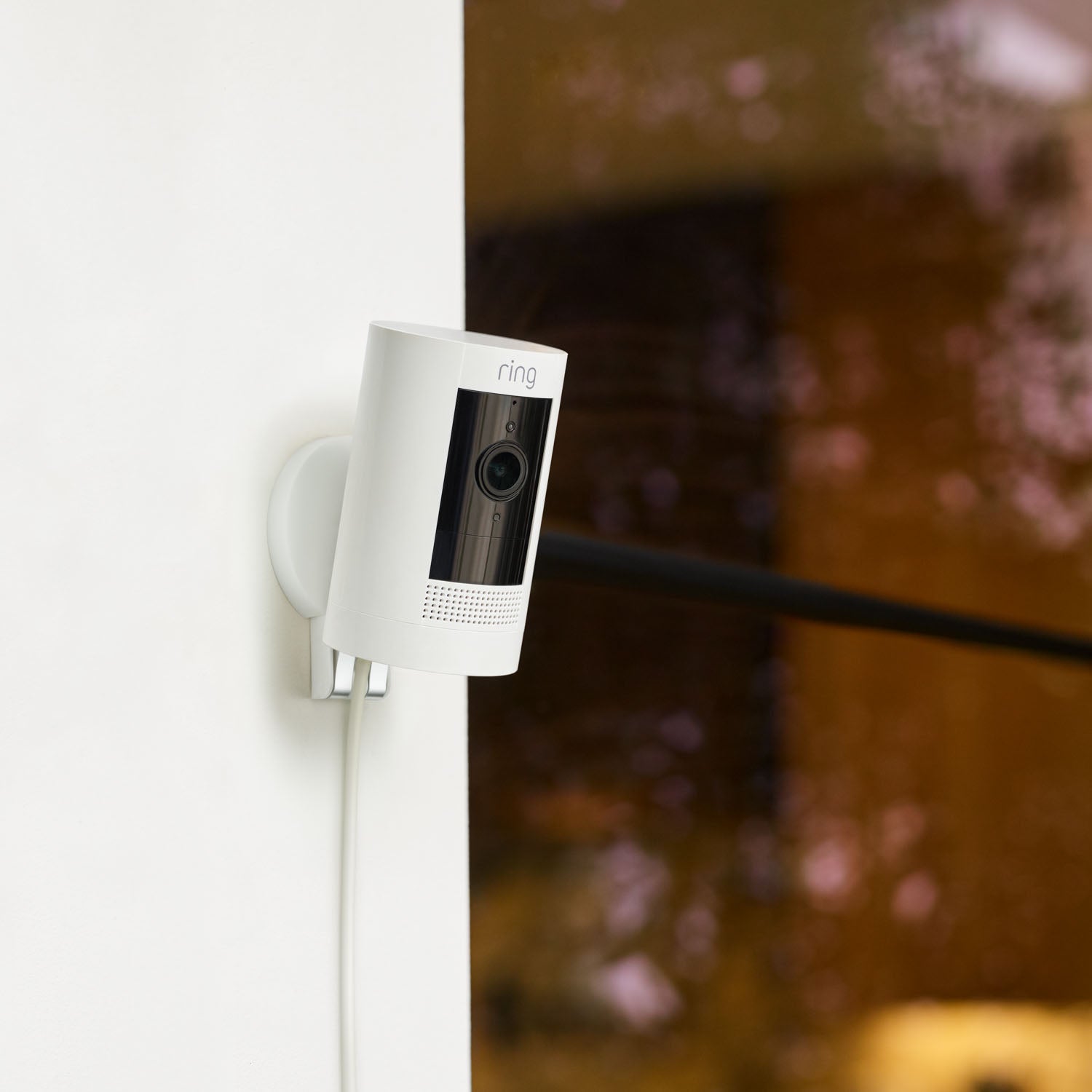 Mount for Stick Up Cam (for 2nd and 3rd Generation) - Mount for Stick Up Cam with plug-in model of camera installed on corner of home.