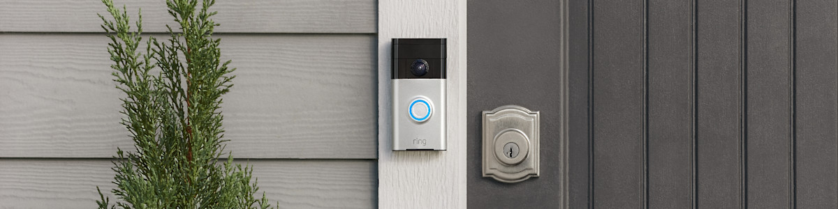 Ring Video Doorbell (1st Generation) on a modern home's front door.