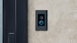 Ring Video Doorbell Elite connected through ethernet on a modern home's front door.